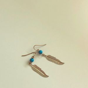 18k gold feather earrings with turquoise bead